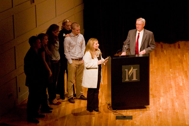 Director Melody Gilbert on stage with Mr. Mondale and his family