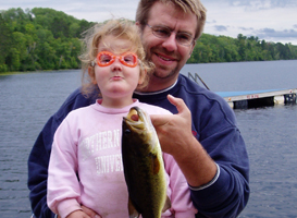 Gabby fishing with her dad