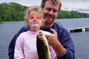 Gabby fishing with her dad